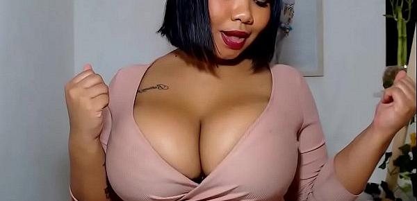  Busty ebony babe N4TYD0LLL20 shows tits and shakes ass in tight shorts